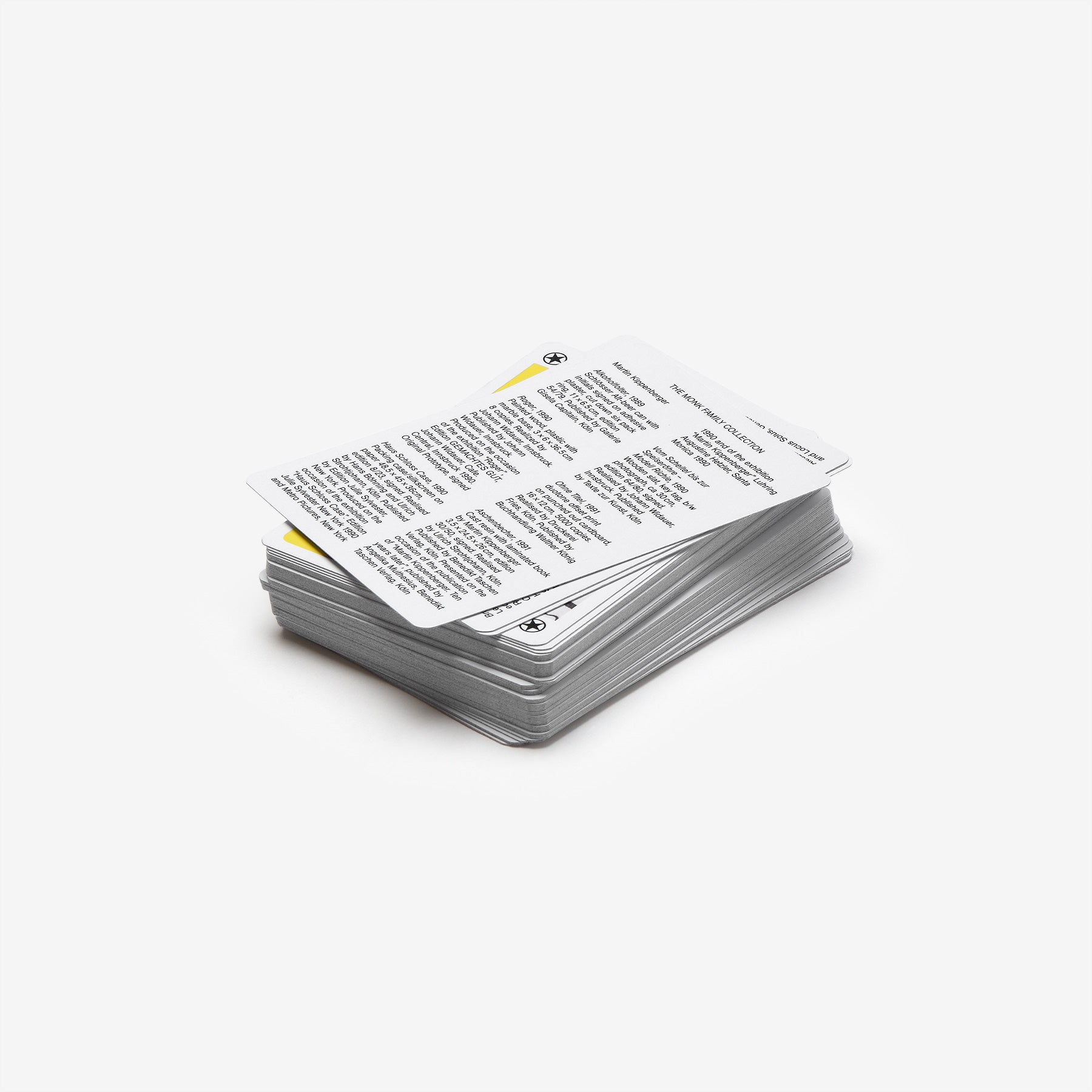 A collection of nine Kippenberger editions, one Boetti watch, a cigarette and yellow by Jonathan Monk